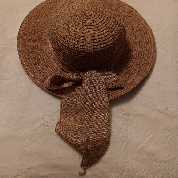 Nwot Straw hat w bow, tan,never worn elastic inside if want - Picture 1 of 4